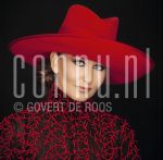 31-08-2003 Petra Berger at studio in Amsterdam, by order of Glossy, Augustus 31, 2003.

[keywords]Portret, Hat[/keywords]